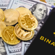 Stock photo of Binance logo on phone against US currency